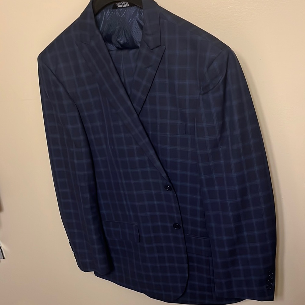 Beautiful navy box pattern two piece suit, two button. Excellent condition